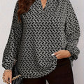 Loose-fitting plus size women's fashion shirt with wide sleeves and V-neck, featuring a stylish print to create a slimming effect.